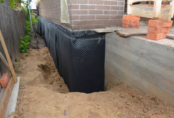 Happy homeowners after waterproofing job in Bridgewater